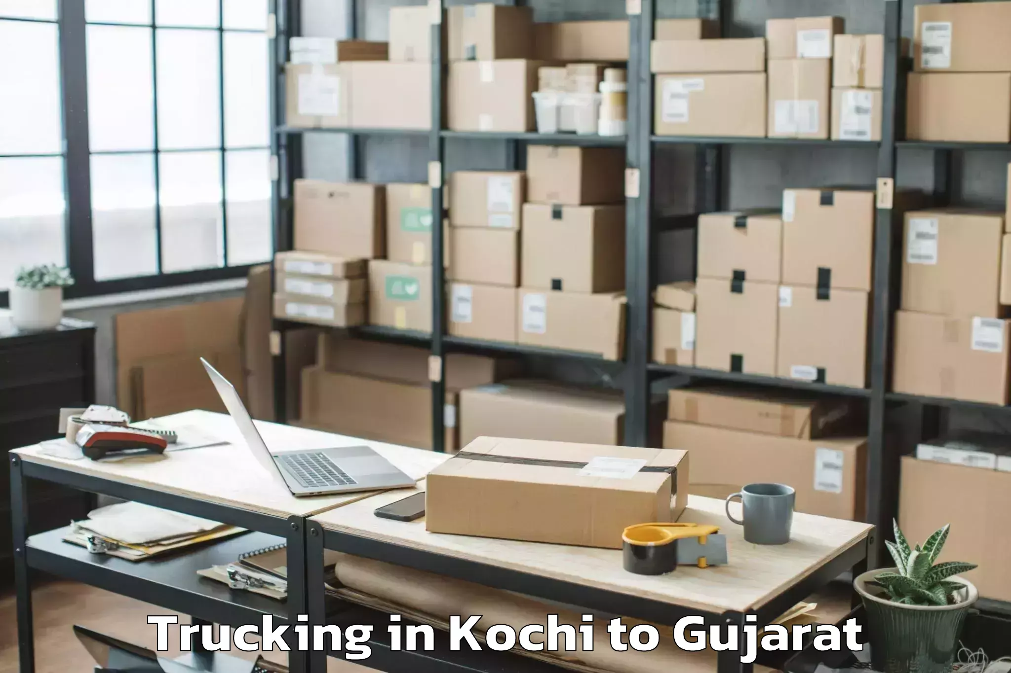 Book Kochi to Kalol Trucking Online